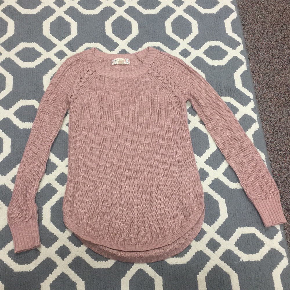 Pink knitted sweater